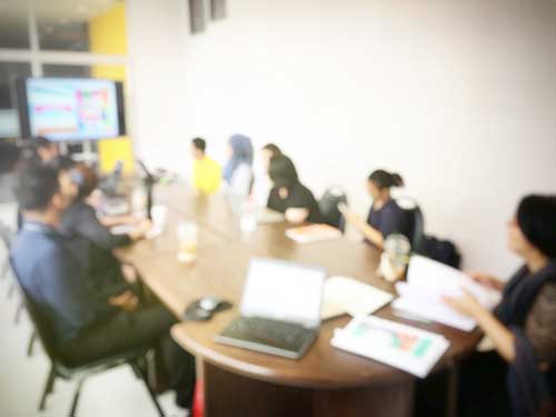 Insurance consultants working at a conference table